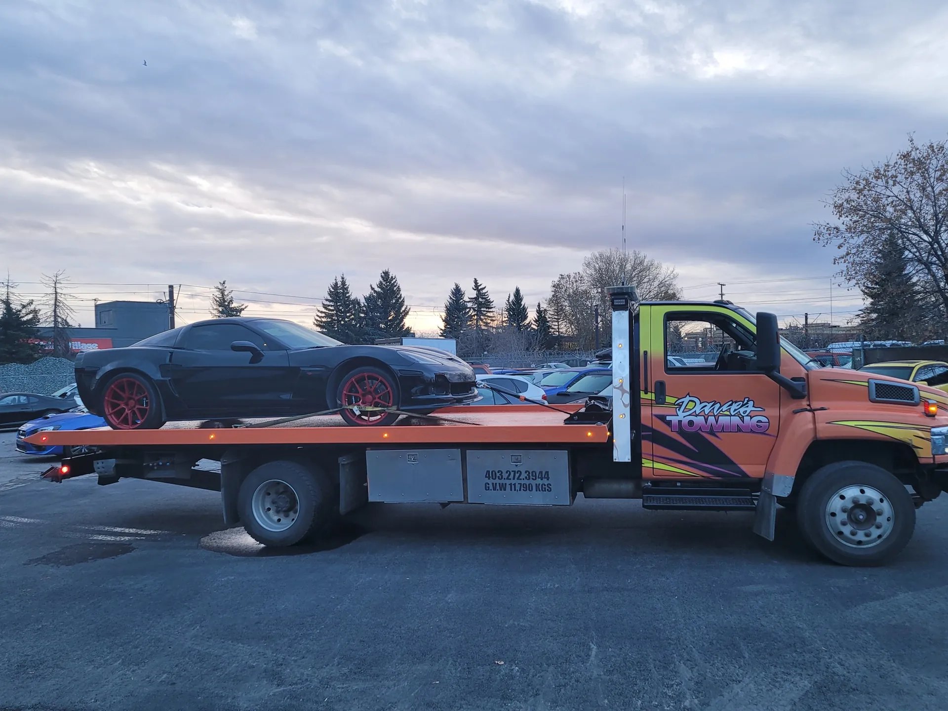 Performance car transport – Chevrolet Corvette with red wheels, Calgary